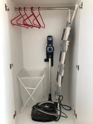 a camera on a stand in a room at Seaview penthouse by the beach in Kalívia Thorikoú