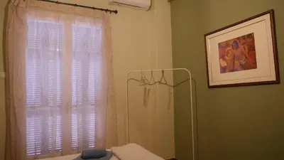 a bathroom with a shower and a window at Classic Athenian house 2mins from metro in Athens