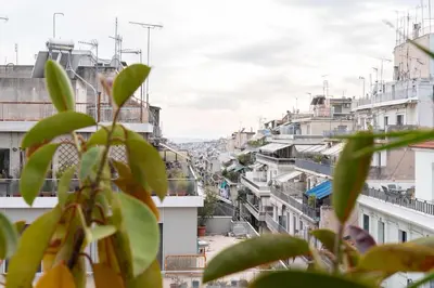 a view of a city from a building at Lycabettus view Vintage penthouse flat in Exarchia in Athens