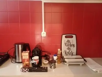 a kitchen counter with a counter top with a counter top at Exarcheia cozy nest in Athens