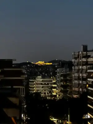 a view of a city with tall buildings at Terrace Garden Close To Sea in Athens