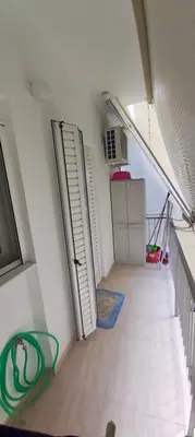 an attic room with an open door and a staircase at Styl Apartment in Athens