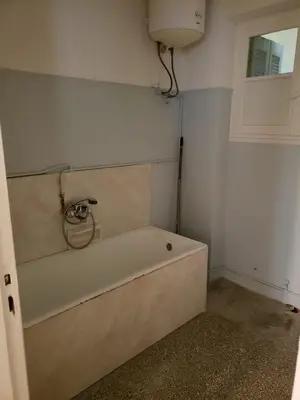 a bathroom with a bath tub in a room at Work, relax, enjoy - SHARED APARTMENT in Athens
