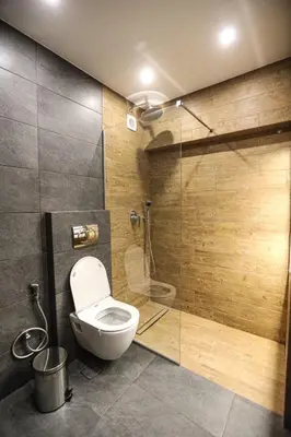 a bathroom with a toilet and a shower at NEW COSY HOME KYPSELI ATHENS heart! in Athens