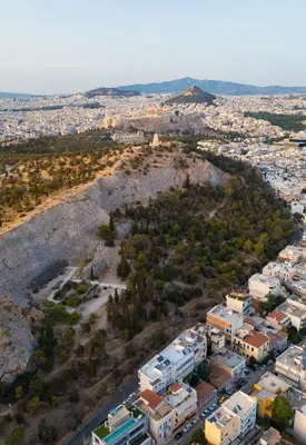 an aerial view of a city with buildings at Amazing View Studio at Filopappou Hill in Koukaki! in Athens