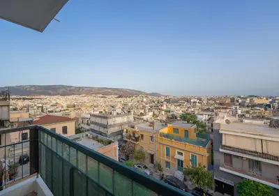 a view of a city from a building at Amazing View Studio at Filopappou Hill in Koukaki! in Athens