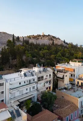 an aerial view of a city with buildings at Amazing View Studio at Filopappou Hill in Koukaki! in Athens