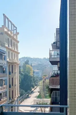 a view of a city street from a building at Central Apartment near Archeological Museum in Athens
