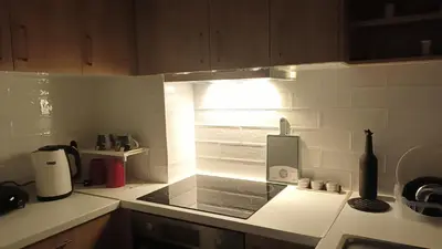 a kitchen with a sink and a window in it at Ισόγειο διαμέρισμα με υπαίθριο χώρο in Athens