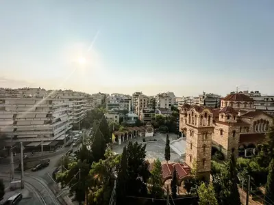 a view of a city with a church and buildings at Beach rooftop Athens Riviera in Athens