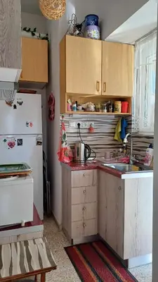 a kitchen with a white refrigerator and a sink at cozy διαμέρισμα με υπέροχη θέα ! in Athens