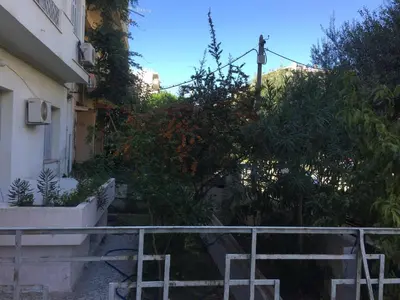 a set of stairs leading up to a building at Simple & Spacious - Shared Accomodation in Athens