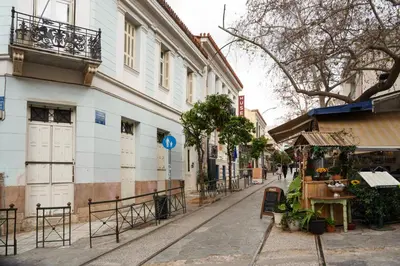 a street in an old town with a building at Acropolis Hidden Gem- The perfect Athenian Hideaway in Athens