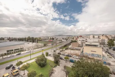 an aerial view of a city with a street at Modern Apartment in Athens