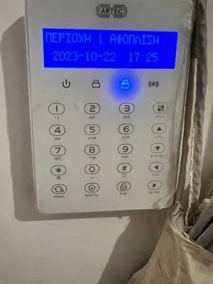 a microwave with a digital timer on it at Cozy Nest at Lykavitos in Athens