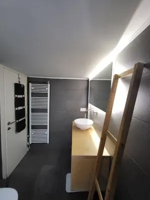 a bathroom with a sink and a toilet in it at Painters apartment in Athens