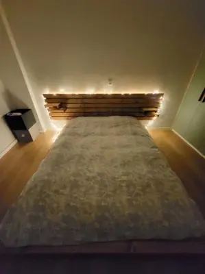 a bedroom with a large bed in a room at Painters apartment in Athens