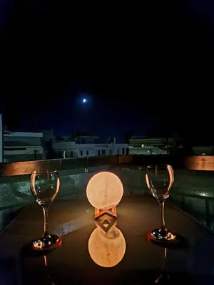 two wine glasses sitting on top of a table at Luxury 2BR Ellinikon Apartment Oasis - Athens Riviera in Athens