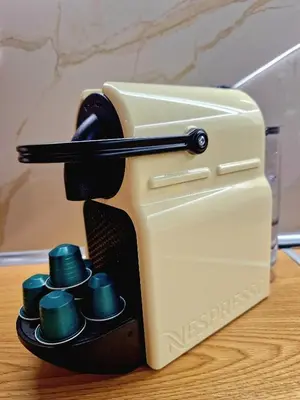 a toaster sitting on top of a wooden table at Luxury 2BR Ellinikon Apartment Oasis - Athens Riviera in Athens