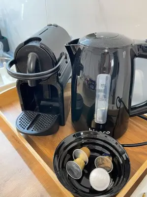 a coffee maker sitting on top of a counter at Zografou City Studio in Athens
