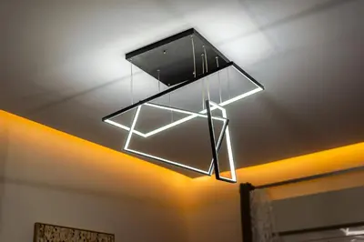a light fixture hanging from the ceiling of a room at Spacious Garden apt in Athens