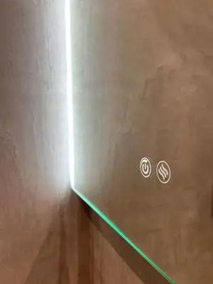 a close up of a door with two stickers on it at Iris Suite by Zeussuites in Athens