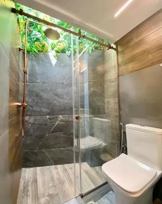 a bathroom with a shower and a toilet at Sophia Urban lux in Athens