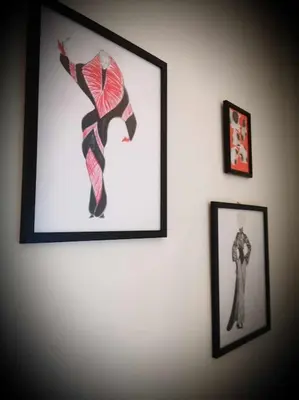 two framed pictures hanging on a wall at CDV stylish Athens flat in Athens