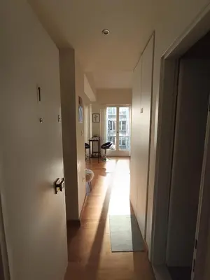 an empty hallway with a door open to a room at CDV stylish Athens flat in Athens