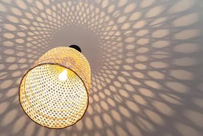 a ceiling light with a shadow of a fan at Zen Spring, Neapoli in Athens