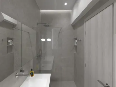 a bathroom with a shower with a sink and a glass shower door at Chic and modern apartment in the center of Kolonaki in Athens