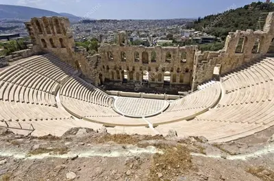 an empty amphitheater in front of a building at Home 7 Minutes Away From Stavros Niarhos in Athens