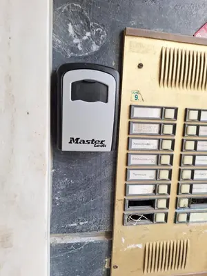 an electronic device with a toaster sitting on a table at Ovelix apartment in Athens