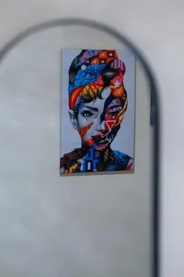 a painting of a woman on a wall at Piraeus Marina Haven 2 in Piraeus