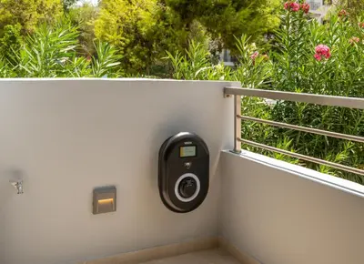 a parking meter on the side of a wall at Fiftyone Deluxe Studio in Athens