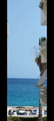 a view of the ocean from a building at Artemis sea house in Porto Rafti