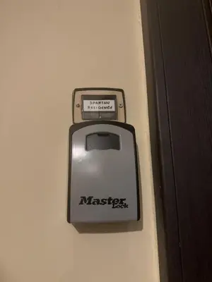 a machine is hanging on the side of a wall at Spartan Residence in Athens