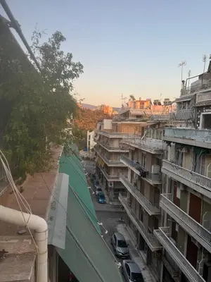 a view from a balcony of a city with buildings at Spartan Residence in Athens