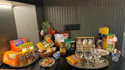 a table topped with wine glasses and other food at Sarakin's Mansion Luxury Retreat in Athens