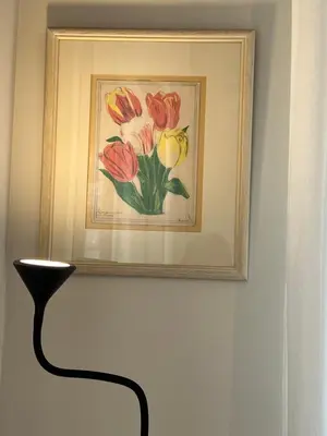 a picture of a painting of flowers on a wall at CK Athens Fine Stay Apartments - Lux & Modern - 2 min from Metro in Athens