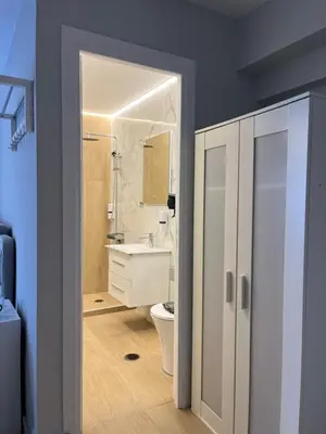 a bathroom with a toilet and a sink at Aristeidou 10 Suite by Zeussuites in Athens
