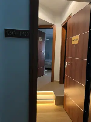 a door leading into a room with a hallway at Aristeidou 10 Suite by Zeussuites in Athens