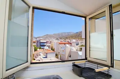 a balcony with a view of a city at Glyfada Panoramic view penthouse in Athens