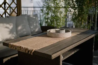 a wicker table with two bowls on top of it at MrK Rooftop 1 in Athens