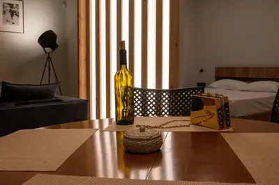 a bottle of wine sitting on top of a table at Astak in Piraeus