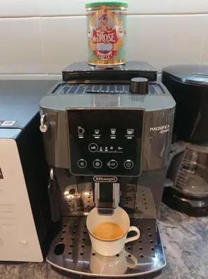 a coffee maker with a cup on top of it at Athens Riviera Beach Retreat in Athens