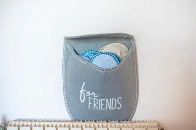 a wallet with the words for friends written on it at Shoreline Athens Riviera in Athens