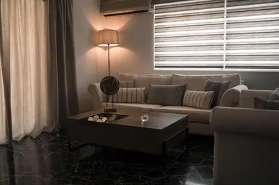 a living room with a couch and a coffee table at Athens Horizon in Athens