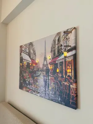 a painting of a city street with the eiffel tower at Elliniko Luxury Apartment in Athens