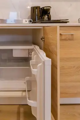 a kitchen with an open cabinet with a sink at Sweet greek memories C in Athens